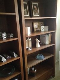 Two of the three matching book shelves