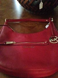 Fine looking Michael Kors red  leather purse