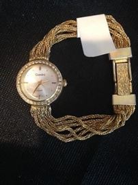 Gold colored and rhinestone Cardini watch
