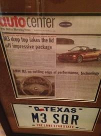 Framed auto news and license