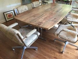 29. 6 Eames Lifetime Commercial Arm Chairs w/ Chrome Base on Casters (24'' x 23'' x 34'')                                                                  28. Woodgrained Formica Dining Table w/ Chrome Base Trestle (48'' x 96'')