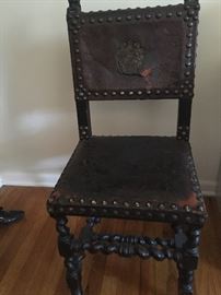 Set of four carved  19th century chairs with leather seats
