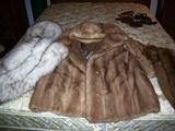 Several fur coats, including a swing mink coat with matching hat and fox shrug with hat - all clean and priced to sell.