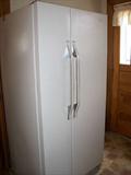 Magic Chef double door refrigerator. Works fine.