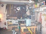 Larger view of one of the three garages/sheds. Good lawn mower.