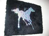 This piece is by a local artist and is featured on her website.