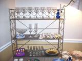 Wineglasses, bric a brac - notice wedgwood vase on upper right. Some Dresden pieces, too.