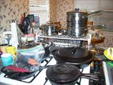 Some good cast iron pots - I know you all LOVE those - BIG skillet with lid, a Le Crueset Sauce Pan.....