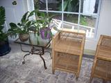 Nice small plant stand and a pair of wicker side tables. We also have a good white aluminum outdoor table and chairs set.