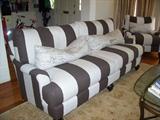 Designer sofa and matching chair in front parlor. All furniture is LIKE NEW. Very "Paris apartment."