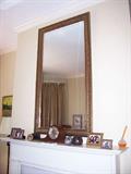 Large above-mantel mirror