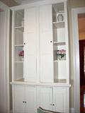 Custom Taaaaalllllllll cabinet was made for this space. Owner says SELL! Lots of storage here. If you have the ceilings for it, it's a great piece. This thing is big, and it's in ONE piece. Shelves are adjustable. Measures 9.5 feet tall, 57 inches wide, and 25 inches deep. You are going to need professional movers to move it. We insist on it.