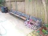 Note the FOUR garden benches in the driveway.....we have two available for sale.