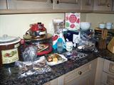 Kitchen stuff....a few small appliances, set of Corelle, set of Oneida stainless flatware, kitchen gadgets, etc.