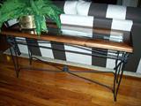We have a pair of these long skinny tables - make great sofa backs....