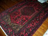 One of several good oriental rugs - two of them still have the auction labels attached.....