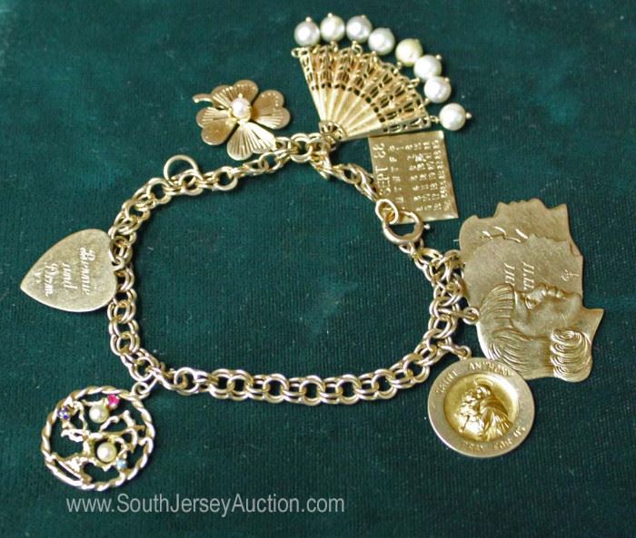 Gold Filled Bracelet with 6 14 Karat Gold Charms and 3 Gold Filled Charms 