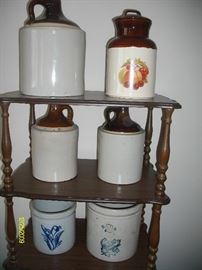 Variety of crocks/jugs.  Shelf also for sale