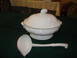 Antique soup tureen with ladle