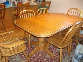 Oak dining room table and chairs