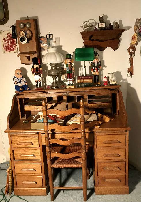 antique Oak S scroll Desk . Ladder Back Chair ,Antique Oak Wall Telephone , Lamps , Nut crackers , Doll 