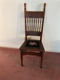 Antique spindle back oak chair with needle point seat 