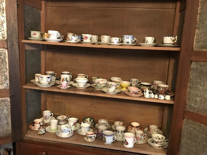 Large collection of demitasse cup and saucers