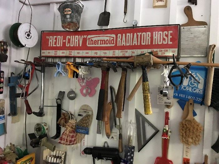 Work shop tools and vintage signs 