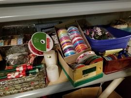 Boxes of crafting ribbons, candles, silk flowers, etc