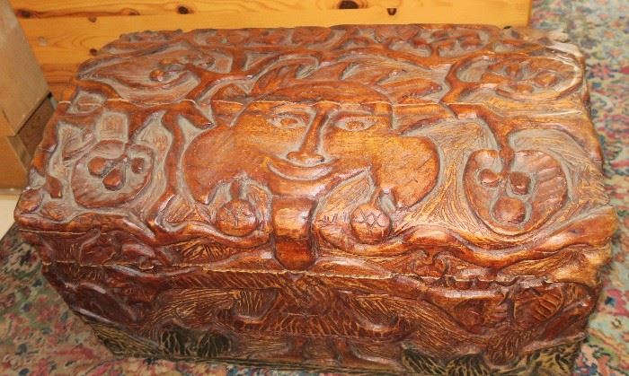 Carved trunk, possibly Koa wood?