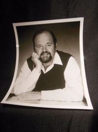 19.	Dom DeLouise Convention Autograph Photograph (Black Vest, Unsigned)