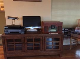 Entertainment Console/Book Case, Brass Desk Lamp, Electronics.
