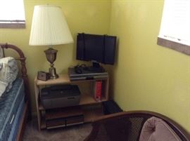 Lamp, Alarm Clock, Sceptre 20in. Monitor, HP printer, Compac CPU, Cassette Storage Box.