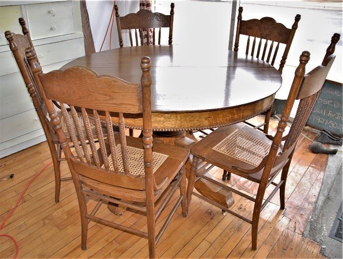 Lot# 3 Antique Round Carved Oak Pedestal Table w/ Leaves Lot# 4 5 Antique Oak Pressed Back Chairs with Cane Seats