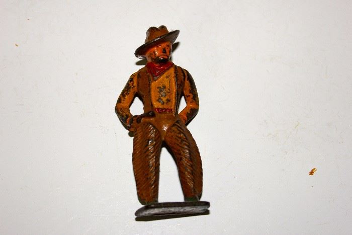 Cast iron tiny cowboy, many more retro  and antique toys