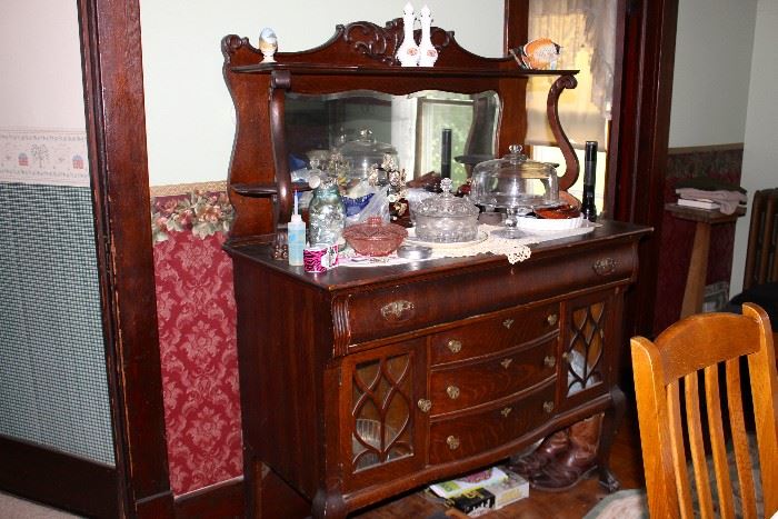 Beautiful, detailed antique buffet with mirror, glass panel doors and curved drawers