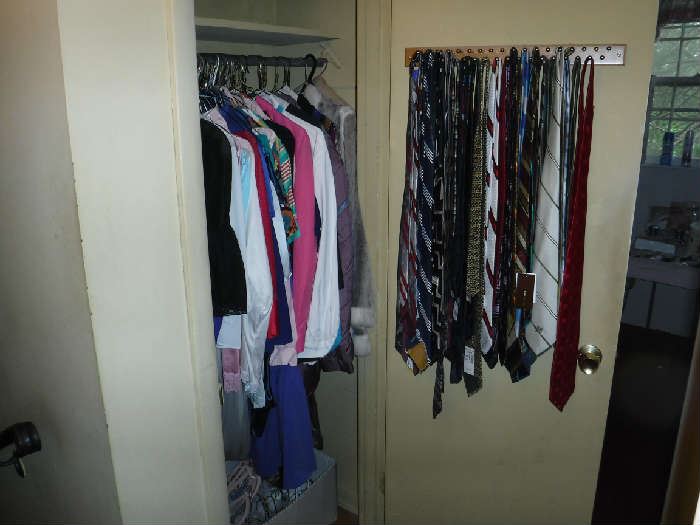 Men's ties and another closet full of clothing (there are 2 more like it!)