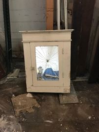 medicine cabinet with cracked mirror - located off site