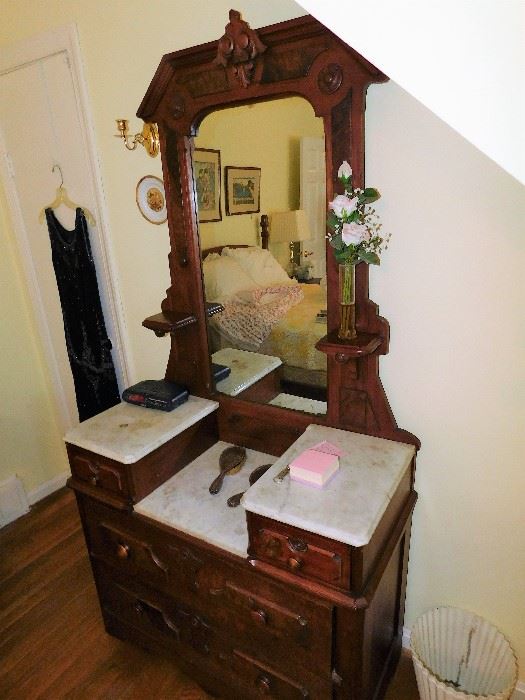 Several wonderful antique furnishings throughout the home.