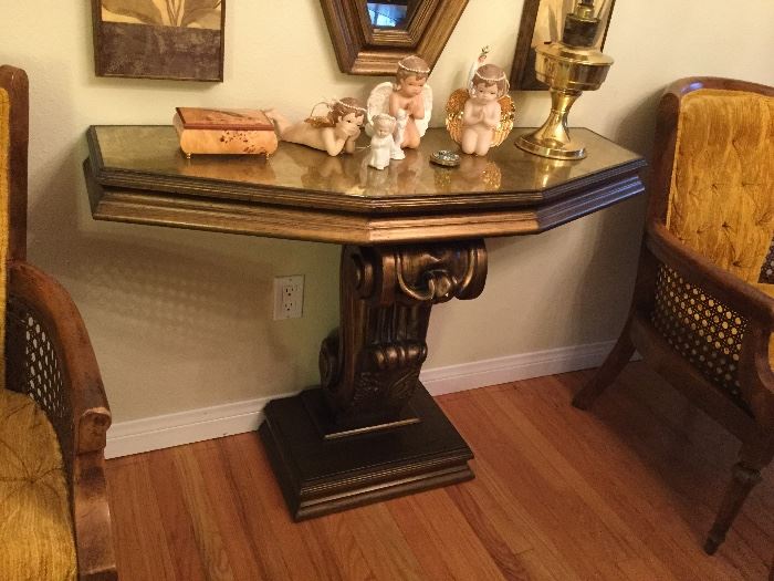 Fancy console table with scroll wave lower detail, gold glass top. Pairs well with wall mirror above, next photo