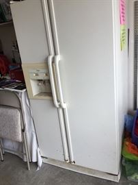 Large garage refrigerator works great, plugged in