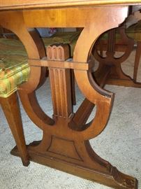 This harp/trellis table is sturdy & mighty but the top has a few watermarks! We think she is worthy of a repurposing, DYI & or painting project!