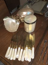 Mother of Pearl handled cutlery, shells & Mother of Pearl cigarette jar.