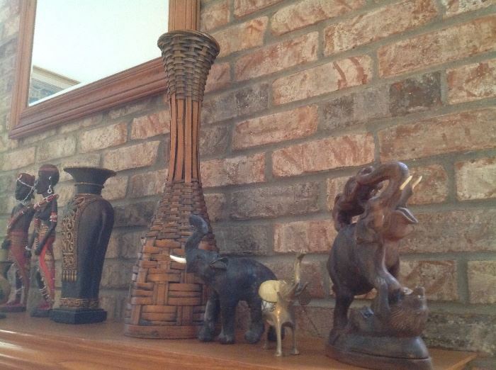 Carved elephants, vase