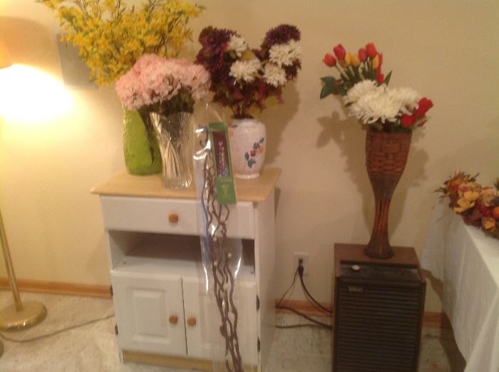 Artificial flowers and vases