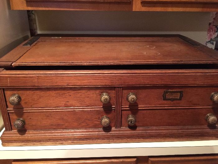 ANTIQUE DRAFTSMAN DESK MAKES AN IDEAL SILVER CHEST