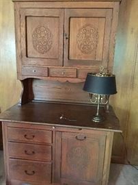 CIRCA 1930'S HUTCH WITH EMBOSSED DETAILS