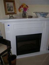 Corner mantel and electric insert