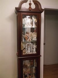 Lighted curio cabinet and angel collection