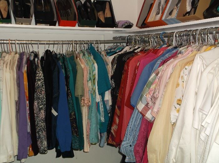 One of three closets and containers full of clothing